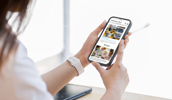Image showing a digital ad on a phone with a map or nearby store notification.